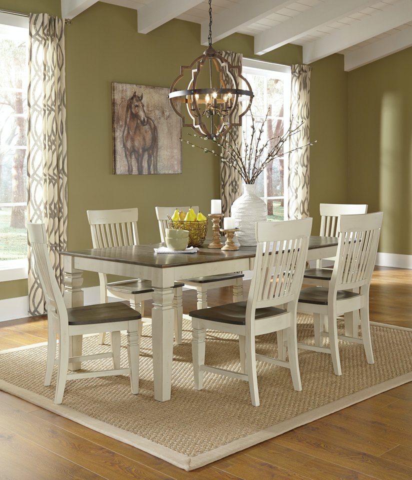 hardwood dining table dark top with white legs and matching chairs on rug