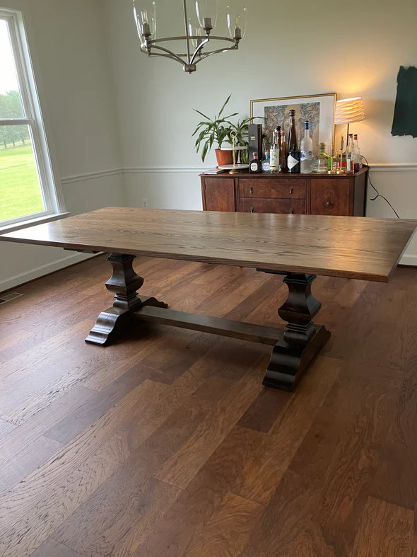 hardwood dining table in dining room no chairs dark floor