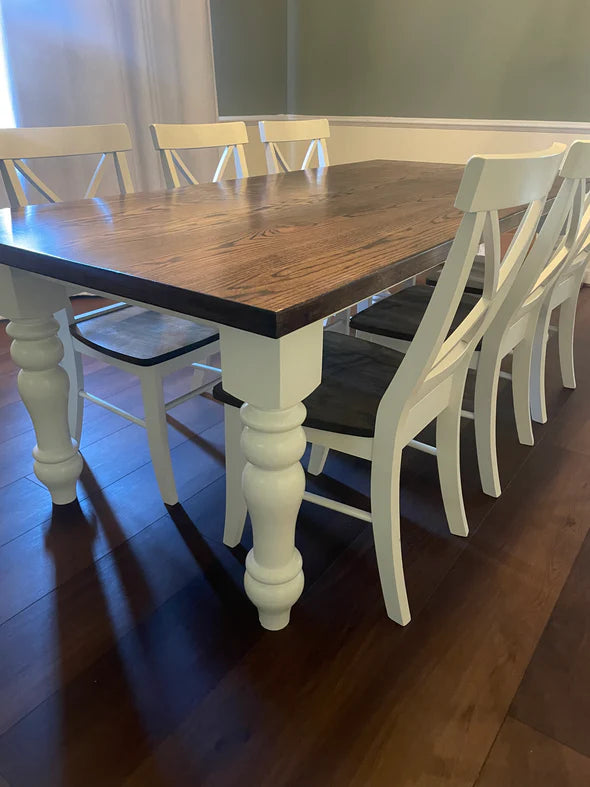 hardwood dining table dark brown top with white legs 6 white chairs with dark stained seats